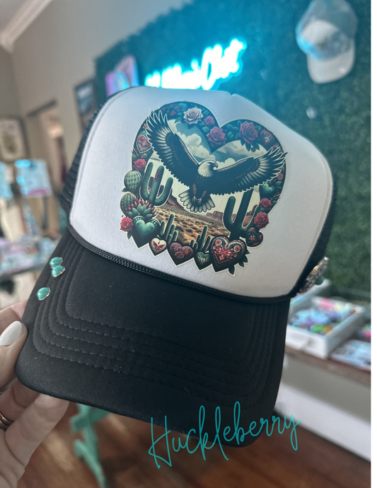 Trucker with Eagle soaring in a western scene. Accented with 3 turquoise rivets and 1 concho