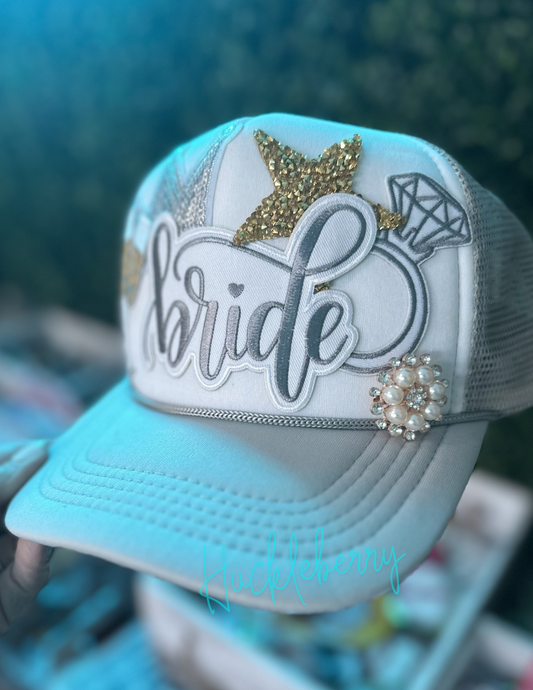 Gray/White Trucker with patches: Bride, diamond engagement ring, gold star, Bride, champagne toast, silver sequin crown, brooch  bridal gift