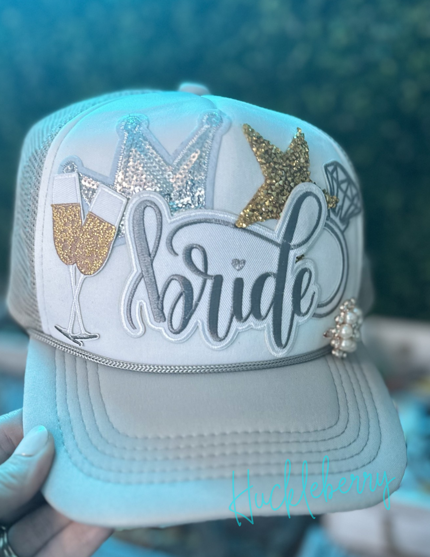 Gray/White Trucker with patches: Bride, diamond engagement ring, gold star, Bride, champagne toast, silver sequin crown, brooch  bridal gift