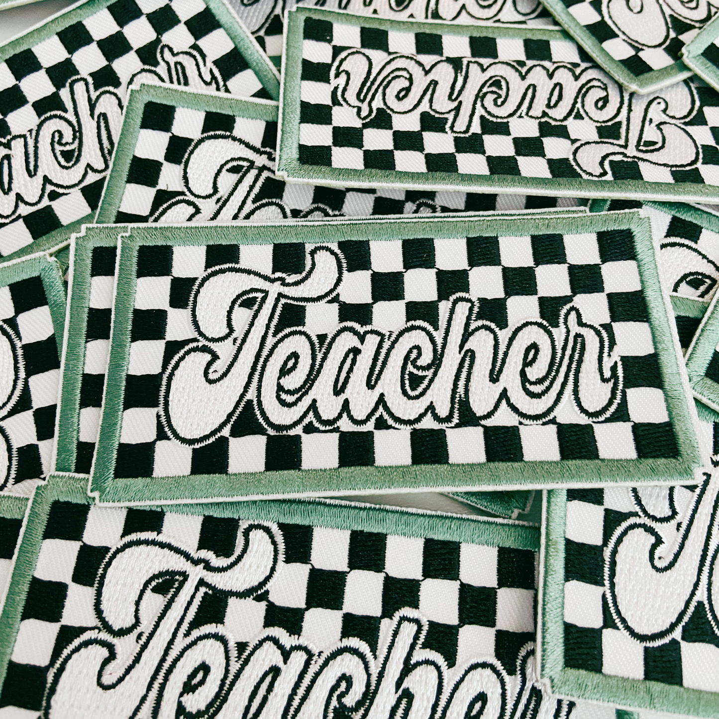 Checkered TEACHER